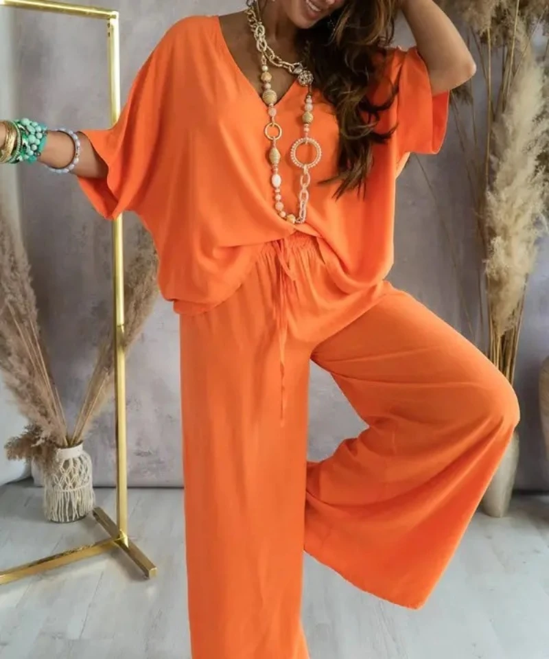 2023 Summer Spring Casual Woman Knit Sets Solid Color V-neck Short Sleeve Blouse Shirt Tops&Wide Leg Pants Sporty Two Piece Set
2023 Summer Spring Casual Woman Knit Sets Solid Color V-neck Short Sleeve Blouse Shirt Tops&Wide Leg Pants Sporty Two Piece Set