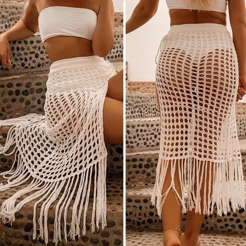 2021 spring and summer new European and American women's sexy see-through hollow knitted skirt split fringed beach skirt
2021 spring and summer new European and American women's sexy see-through hollow knitted skirt split fringed beach skirt