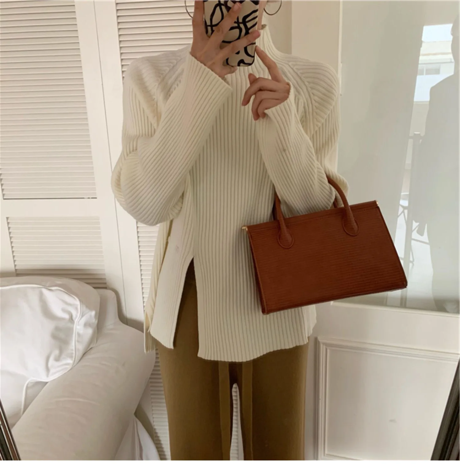 Solid Knitwear Korean High Neck Sweater Women Korean Autumn Winter Long Sleeved Shirt Retro Split Sweater
Solid Knitwear Korean High Neck Sweater Women Korean Autumn Winter Long Sleeved Shirt Retro Split Sweater