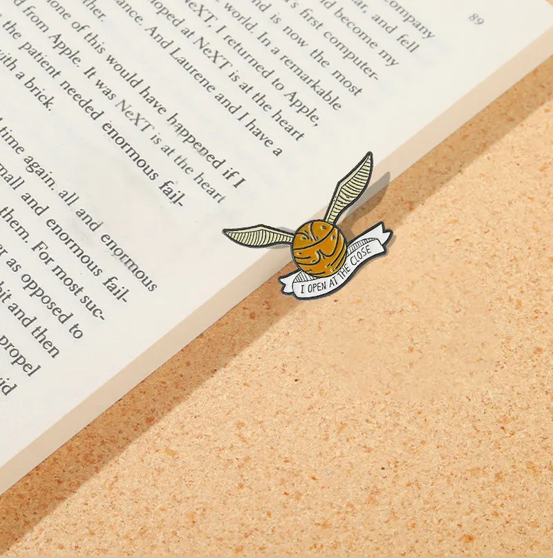 

Golden Snitch Enamel Pins Custom Ball with Wings Brooches Lapel Badges Funny Movie Jewelry Gift for Kids Fans Friends