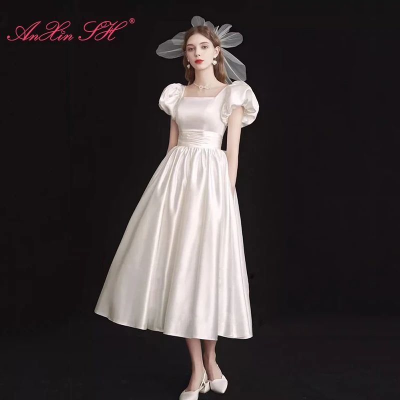 AnXin SH vintage white satin handmade sweetheart neck short puff sleeve big bow Antique light wedding dress little white dress
AnXin SH vintage white satin handmade sweetheart neck short puff sleeve big bow Antique light wedding dress little white dress