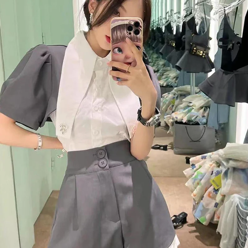 Summer Korean Version Suit Design Sense Puff Sleeve Shirt High Waist Wide Leg Shorts Two-Piece Women's High Street Top Commuting
Summer Korean Version Suit Design Sense Puff Sleeve Shirt High Waist Wide Leg Shorts Two-Piece Women's High Street Top Commuting