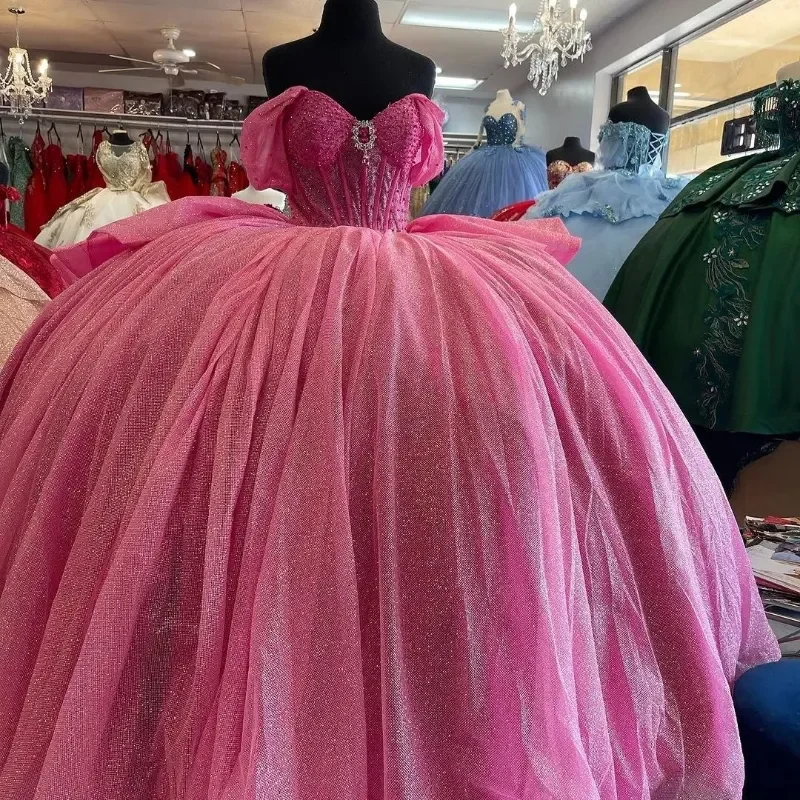 Блестящие розово-красные платья с открытыми плечами для Quinceanera 2024, платья с большим бантом, бусинами и блестками для дня рождения, платья принцессы для выпускного вечера
Блестящие розово-красные платья с открытыми плечами для Quinceanera 2024, платья с большим бантом, бусинами и блестками для дня рождения, платья принцессы для выпускного вечера