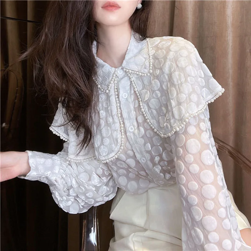 Summer 2023 Women Polka Shirts Big Collar Beaded Blouses Black White Long Lantern Sleeve Party Woman Shirts Loose Slim Blouses T
Summer 2023 Women Polka Shirts Big Collar Beaded Blouses Black White Long Lantern Sleeve Party Woman Shirts Loose Slim Blouses T