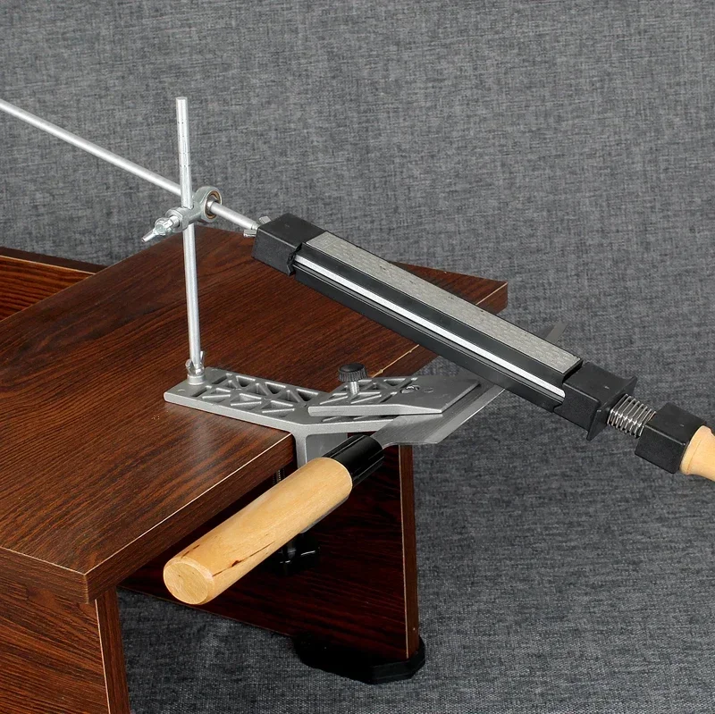 Фиксированная точилка для ножей, профессиональный угловой точильный камень, кухонный точильный камень, Шлифовальная система, алмазная шлифовальная машина, деревообрабатывающий инструмент
Фиксированная точилка для ножей, профессиональный угловой точильный камень, кухонный точильный камень, Шлифовальная система, алмазная шлифовальная машина, деревообрабатывающий инструмент