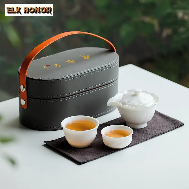 

High End Unfired Mutton Fat Jade White Porcelain Travel Tea Set Set Tea Making Teapot 2 Cup Portable Travel Kung Fu Tea Set Gift