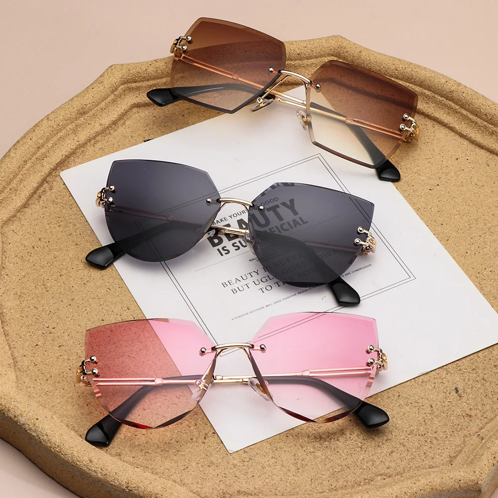 

Cutting Lens UV400 Eyewear Cat Eye Sunglasses Women Metal Sunglasses Shades Rimless