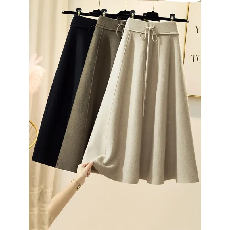 

Женская трикотажная юбка, новая модель в Корейском стиле на осень и зиму, универсальная облегающая трапециевидная юбка средней длины с высокой талией и плиссировкой