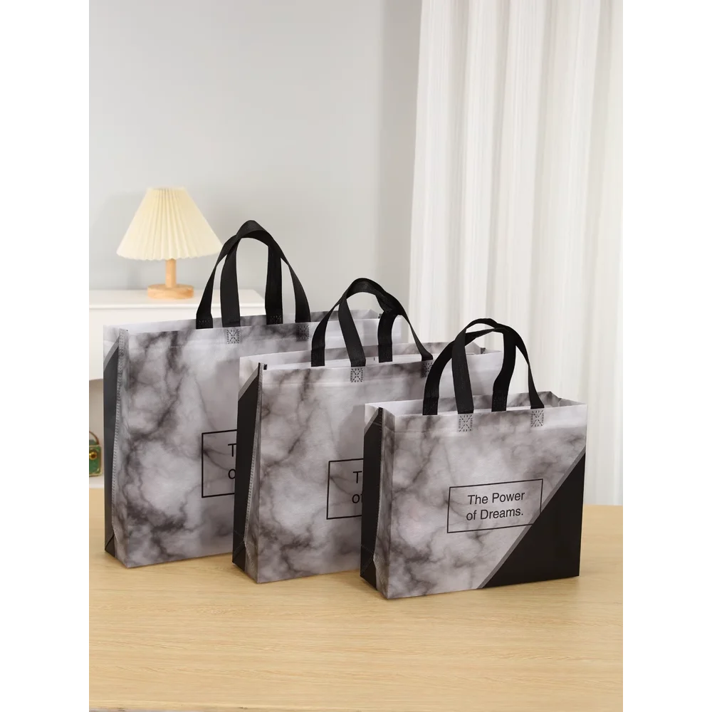 Clothing Bags Non-woven Gift Bags Waterproof Portable Shopping Bags for High-end Fashion Stores.
Clothing Bags Non-woven Gift Bags Waterproof Portable Shopping Bags for High-end Fashion Stores.
