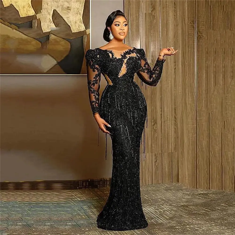 

Sexy Black Evening Dresses Jewel Neck Illusion Lace Appliques Crystal Beaded Party Dress Mermaid Long Sleeves Formal Prom Gowns