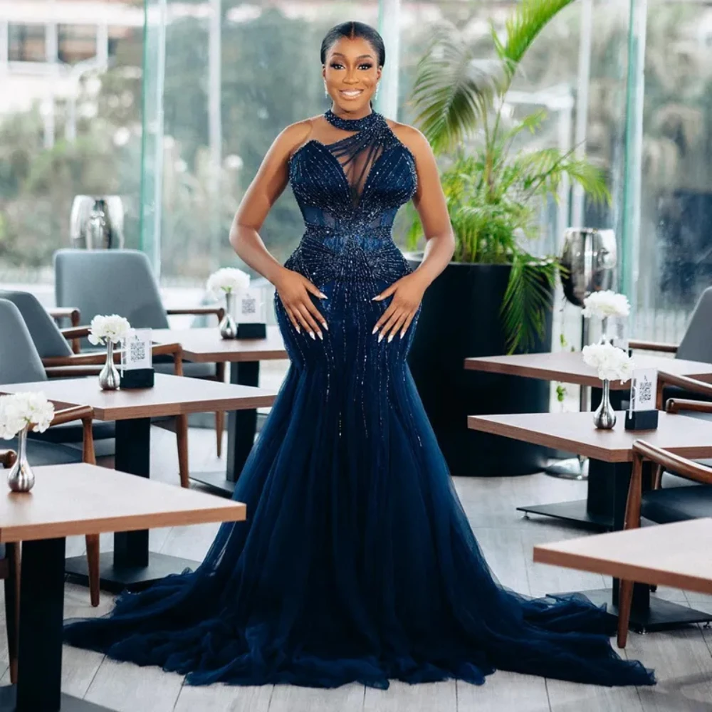 Luxurious Navy Blue African Aso Ebi Prom Dresses Halter Beaded Tulle Elegant Evening Formal Dress for Special Occasion Dresses
Luxurious Navy Blue African Aso Ebi Prom Dresses Halter Beaded Tulle Elegant Evening Formal Dress for Special Occasion Dresses