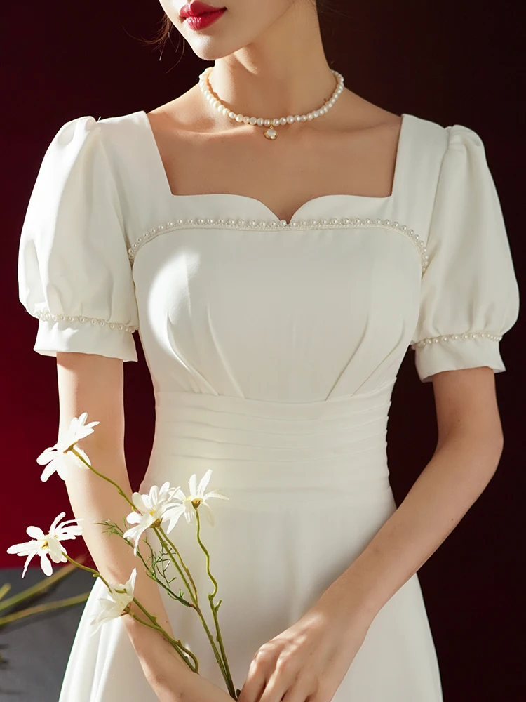 Elegant Satin Evening Dress Square Collar Pearls Puff Sleeve Slim Women Dresses 2023 New White French Style Banquet Female Gowns
Elegant Satin Evening Dress Square Collar Pearls Puff Sleeve Slim Women Dresses 2023 New White French Style Banquet Female Gowns