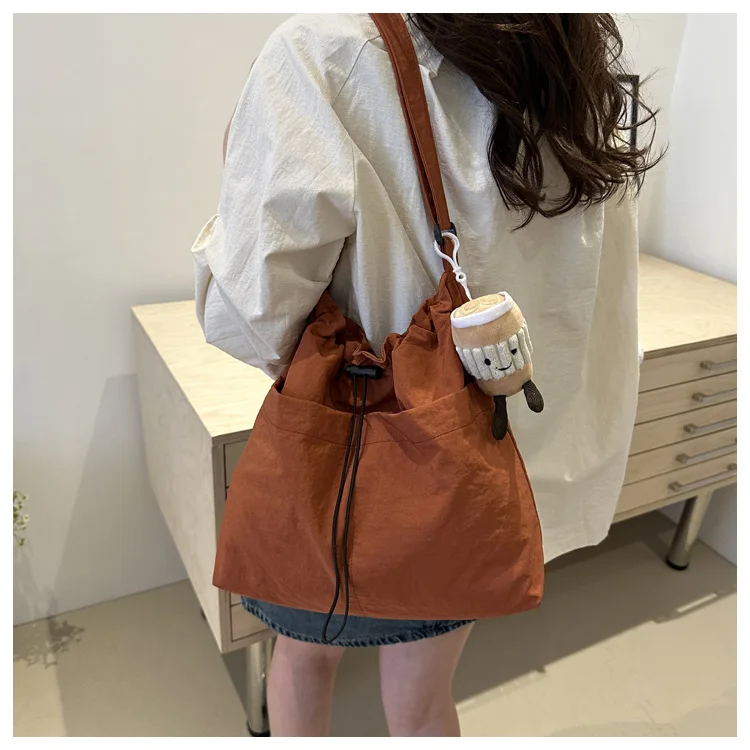 2024 New Large-capacity Waterproof Nylon Cloth Drawstring Pleated Shoulder Bag Travel Leisure Crossbody Bucket Bag 2024 New Large-capacity Waterproof Nylon Cloth Drawstring Pleated Shoulder Bag Travel Leisure Crossbody Bucket Bag