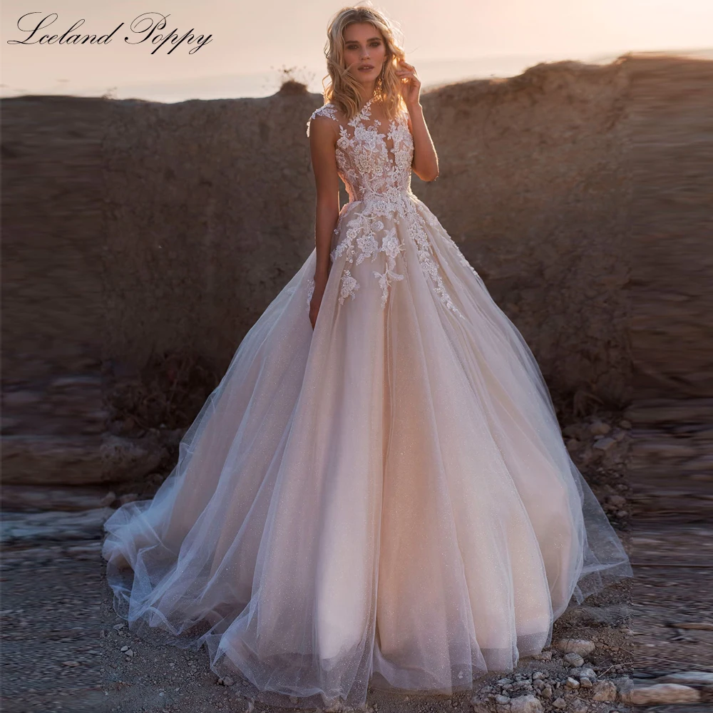 Lceland Poppy женское ТРАПЕЦИЕВИДНОЕ блестящее Тюлевое свадебное платье без рукавов длиной до пола с бисером кружевные аппликации свадебные платья
Lceland Poppy женское ТРАПЕЦИЕВИДНОЕ блестящее Тюлевое свадебное платье без рукавов длиной до пола с бисером кружевные аппликации свадебные платья