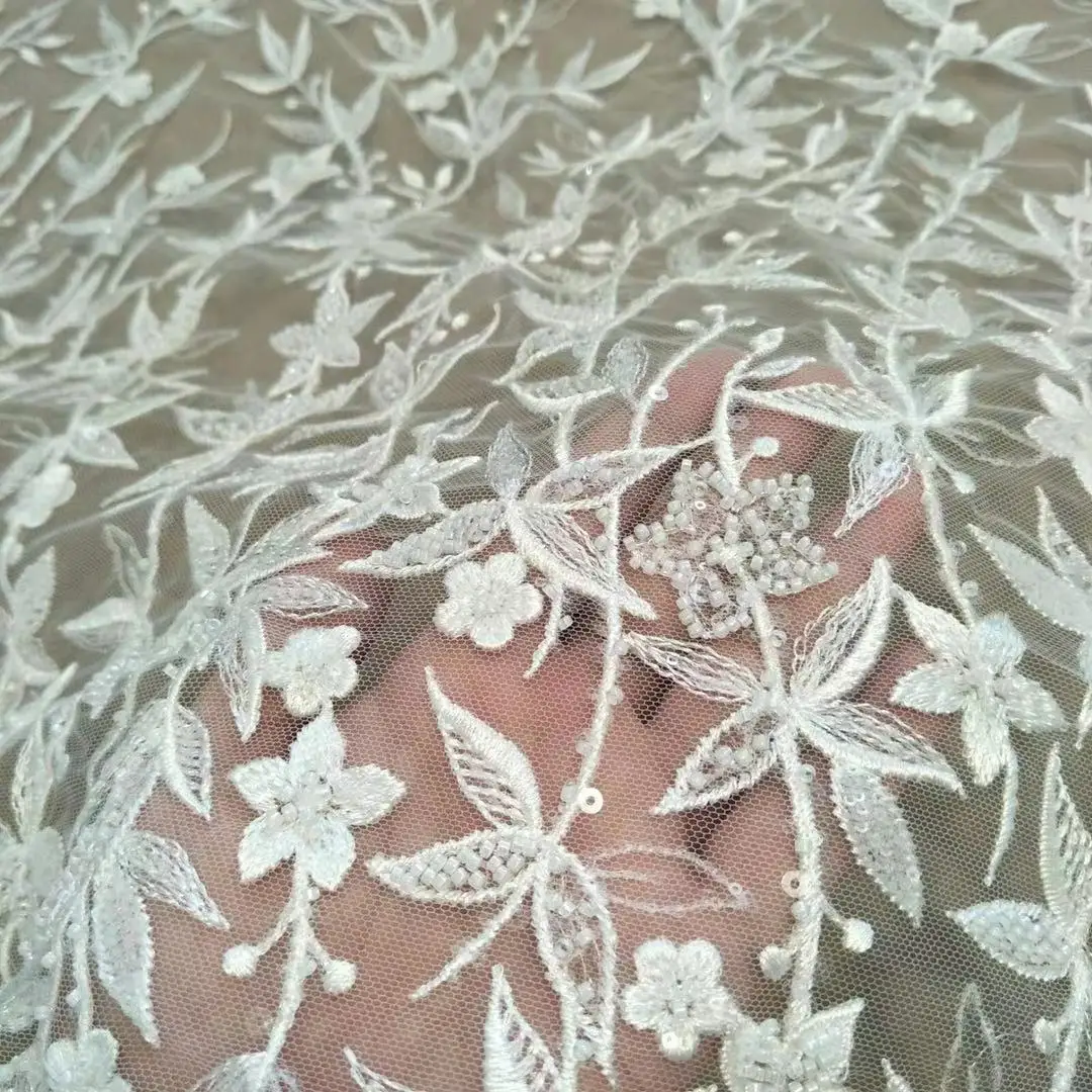 2023 spring and summer beautiful white women's wedding dress fabric rayon material lace with beads and sequins width 130cm
2023 spring and summer beautiful white women's wedding dress fabric rayon material lace with beads and sequins width 130cm
