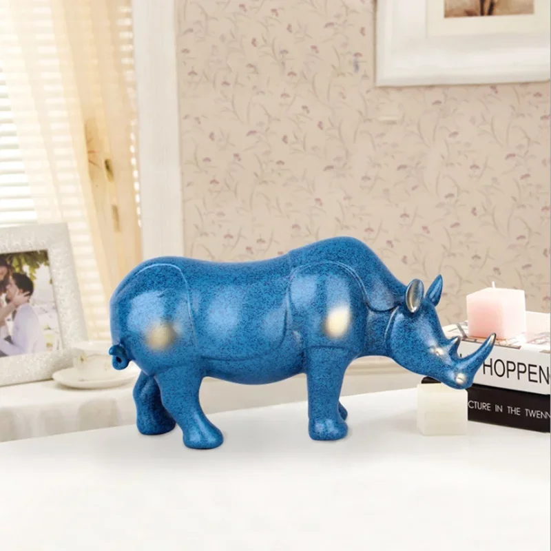 New blue rhino statue, resin modern art sculpture, European home living room decoration, attic office decoration figurine
New blue rhino statue, resin modern art sculpture, European home living room decoration, attic office decoration figurine
