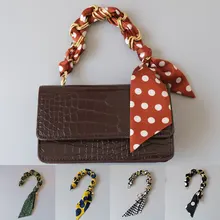 Fashion New Lady Style All-match Silk Scarf Hand-held Short Chain Spring And Summer Handbag Belt Bag Accessories Short Chain
Fashion New Lady Style All-match Silk Scarf Hand-held Short Chain Spring And Summer Handbag Belt Bag Accessories Short Chain