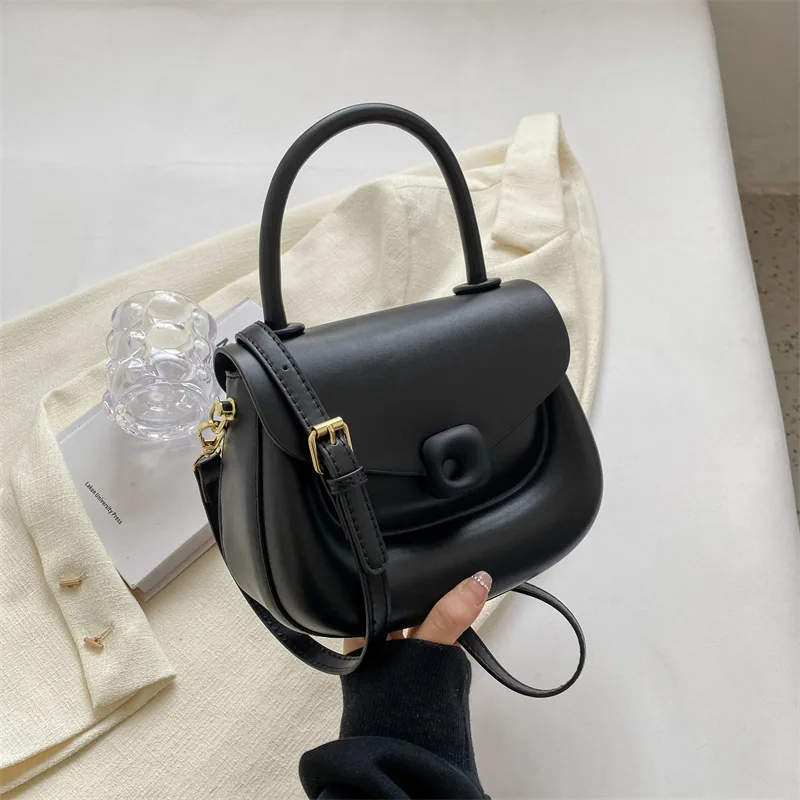 

Candy colored bag 2024 spring/summer new women's high-end texture niche design casual handheld one shoulder crossbody saddle bag