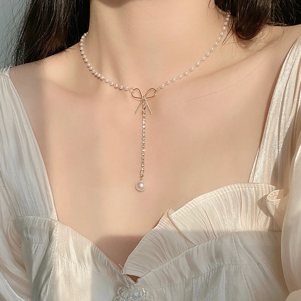 

Женское корейское Модное Длинное Ожерелье IFMIA с подвеской-бантом и кисточкой для женщин 2022 Новое жемчужное ожерелье-цепочка чокер ювелирные изделия для свадьбы