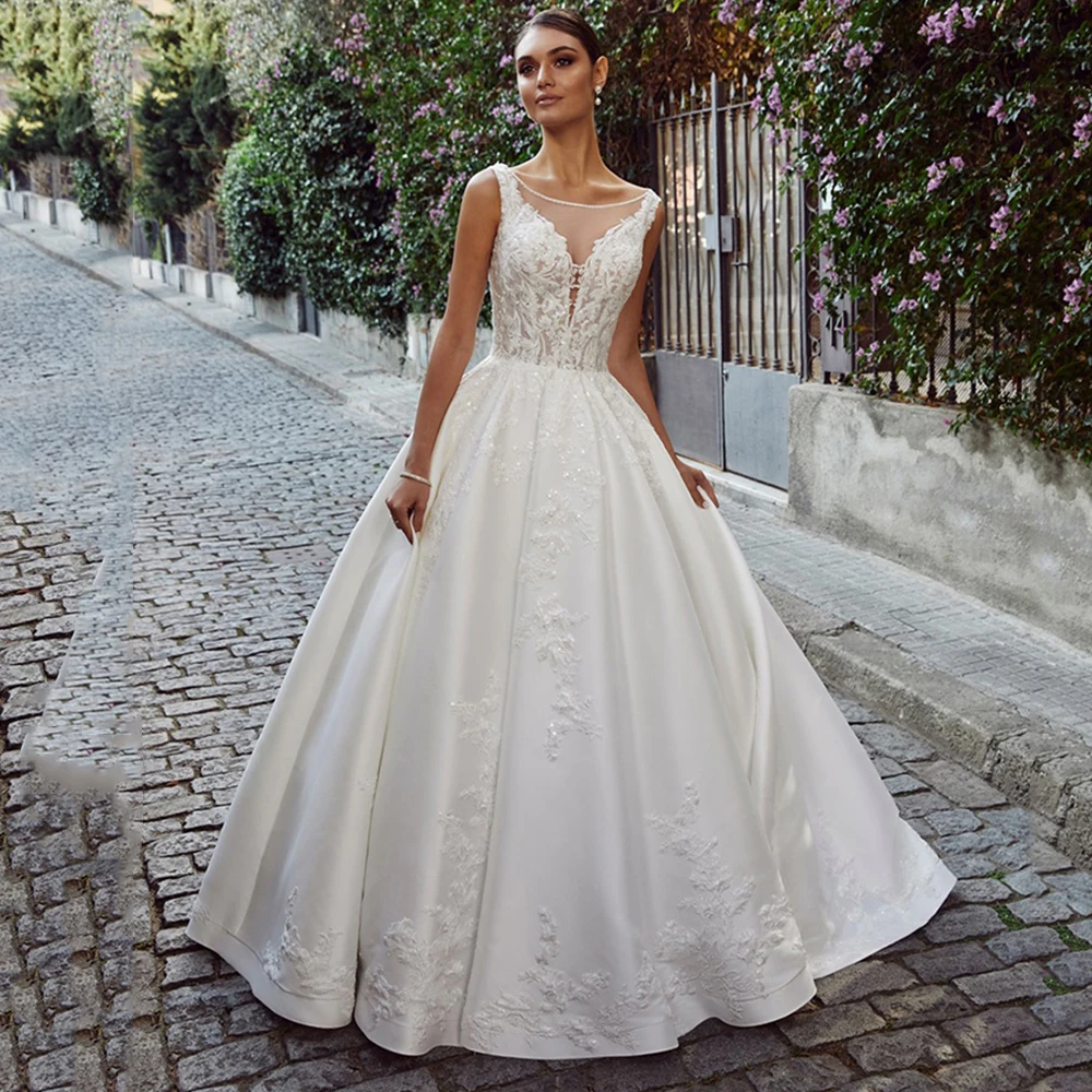 

Romantic Wedding Dresses for Woman Sexy Backless Round Neck Sleeveless A-line Lace Bride Gown Spaghetti Strap فستان الزفاف
