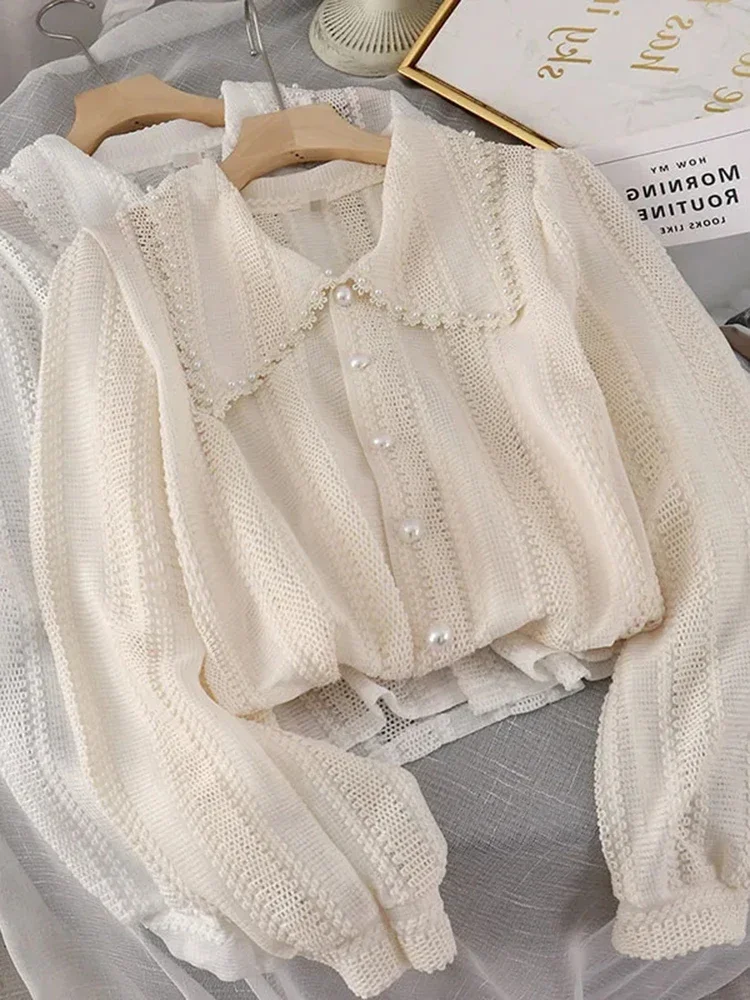 

Женская ажурная блузка с воротником «Питер Пэн», элегантная однобортная тонкая рубашка в Корейском стиле с пуговицами и жемчужинами, X963