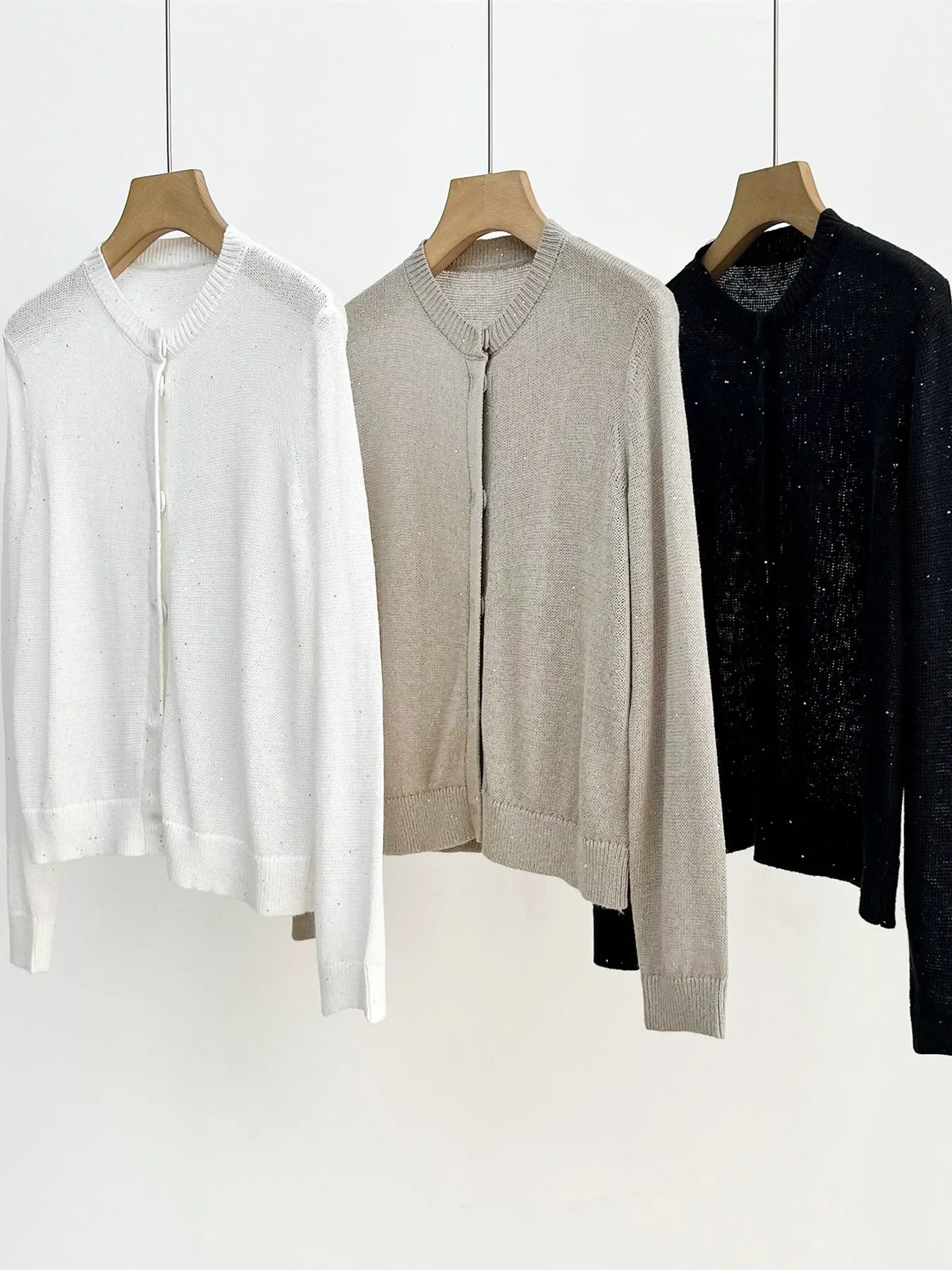 Women Knitted Coat Solid Color Sequin Casual Autumn New O-neck Long Sleeve Cardigan
Women Knitted Coat Solid Color Sequin Casual Autumn New O-neck Long Sleeve Cardigan