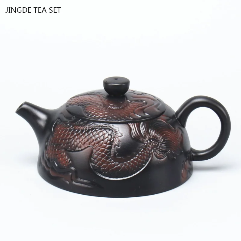 

Pure handmade purple pottery teapot original ore purple clay household Xishi relief lotus single brewing teapot kung fu tea set