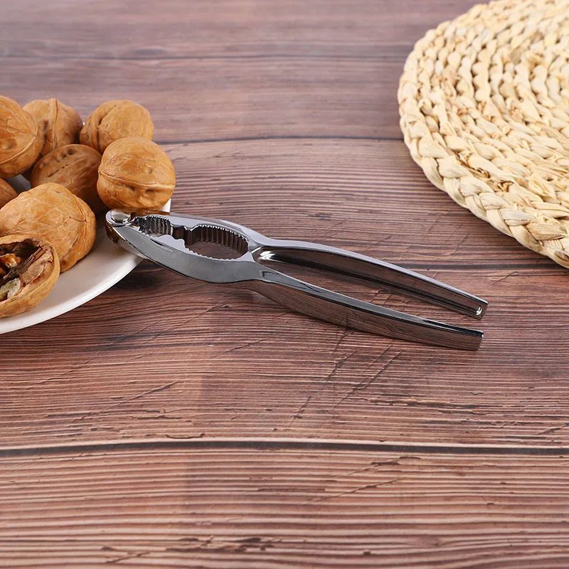 Portable Nut Cracker Kitchen Gadgets Tool Sheller Walnut Opener Plier Thicken Zinc Alloy Walnut Clip Kitchen Accessories ZB745
Portable Nut Cracker Kitchen Gadgets Tool Sheller Walnut Opener Plier Thicken Zinc Alloy Walnut Clip Kitchen Accessories ZB745