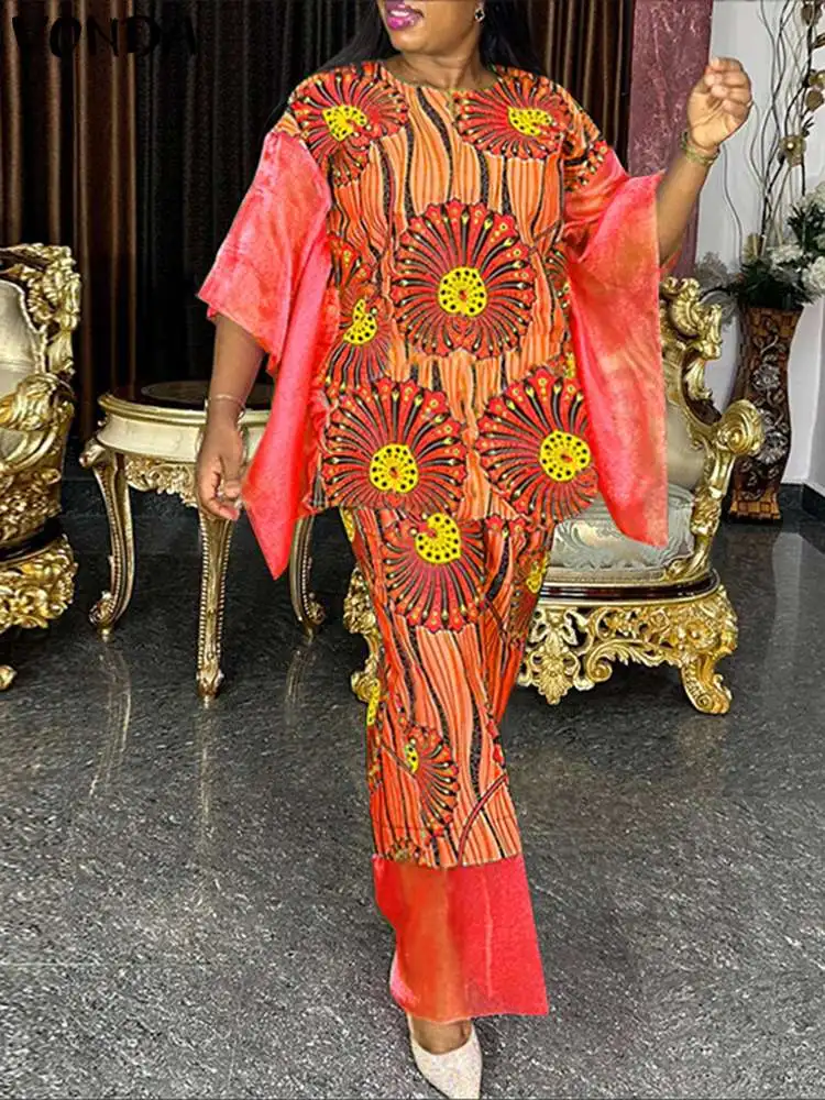 Размера плюс 5XL Женские комплекты 2024 VONDA богемный Печатный винтажный лоскутный топ с расклешенными рукавами юбка макси длинное платье подходящие комплекты
Размера плюс 5XL Женские комплекты 2024 VONDA богемный Печатный винтажный лоскутный топ с расклешенными рукавами юбка макси длинное платье подходящие комплекты