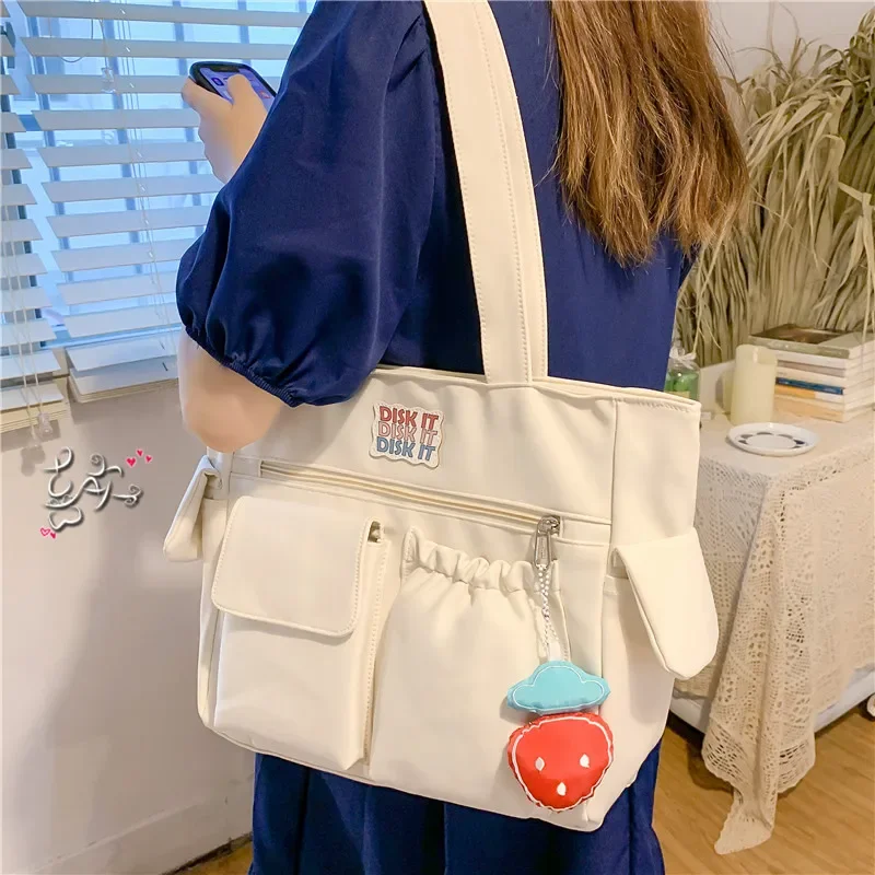 Canvas bag, women's shoulder bag, Japanese simple large-capacity handbag, school bag, school bag, student versatile tutoring bag
Canvas bag, women's shoulder bag, Japanese simple large-capacity handbag, school bag, school bag, student versatile tutoring bag
