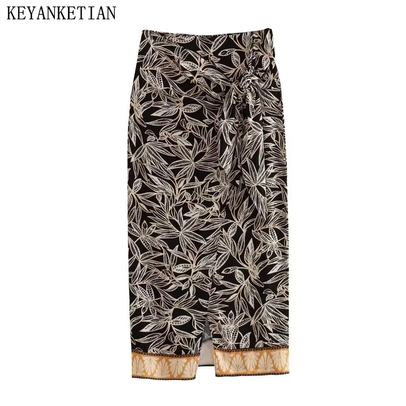 

KEYANKETIAN Summer New Tropical Style Printed Skirt Ladies Asymmetrical Knot High Waist Front Slit Ankle Skirt Holiday Wear