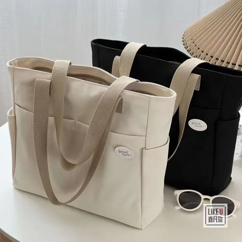 Versatile Canvas Tote Bag for Women, Stylish and Spacious Shoulder Bag for Students, Durable and Fashionable Carryall
Versatile Canvas Tote Bag for Women, Stylish and Spacious Shoulder Bag for Students, Durable and Fashionable Carryall