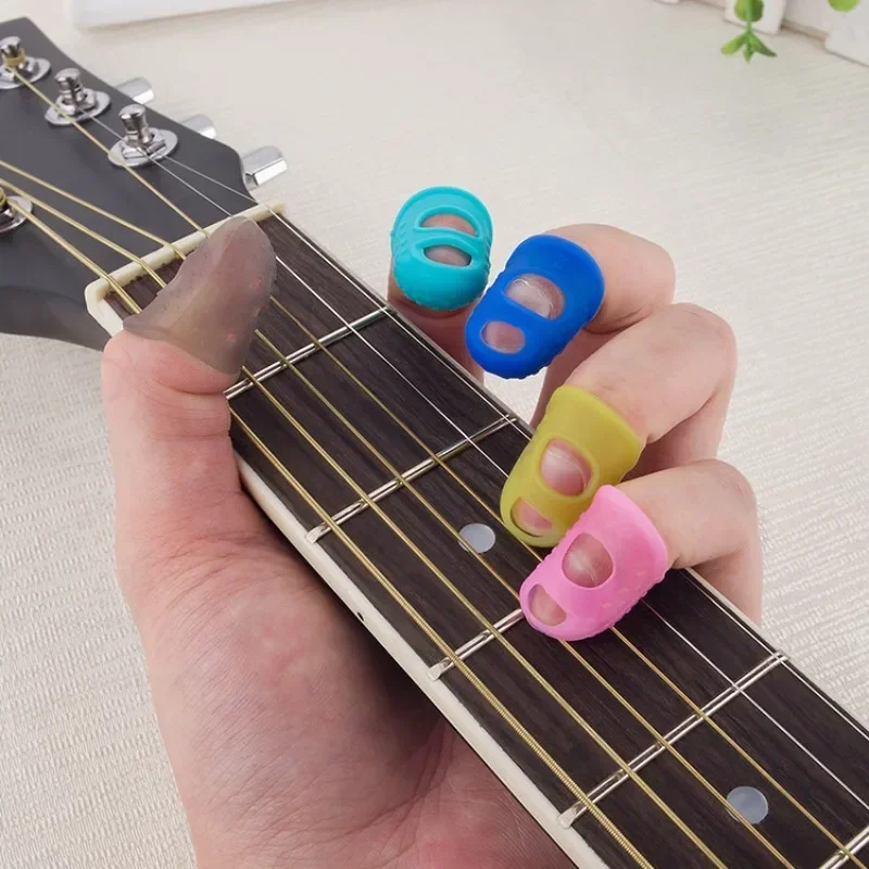 4Pcs/Set Finger Thimbles Sleeve Anti-scald Silicone Gloves Playing Guitar Finger Protection DIY Craft Glove Sewing Guitars
4Pcs/Set Finger Thimbles Sleeve Anti-scald Silicone Gloves Playing Guitar Finger Protection DIY Craft Glove Sewing Guitars