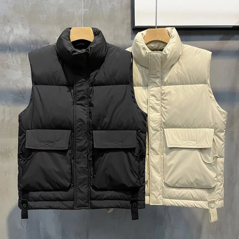 White duck down warm sleeveless vest for men in 2023, new trend versatile stand up collar, camisole, down jacket for men 
White duck down warm sleeveless vest for men in 2023, new trend versatile stand up collar, camisole, down jacket for men
