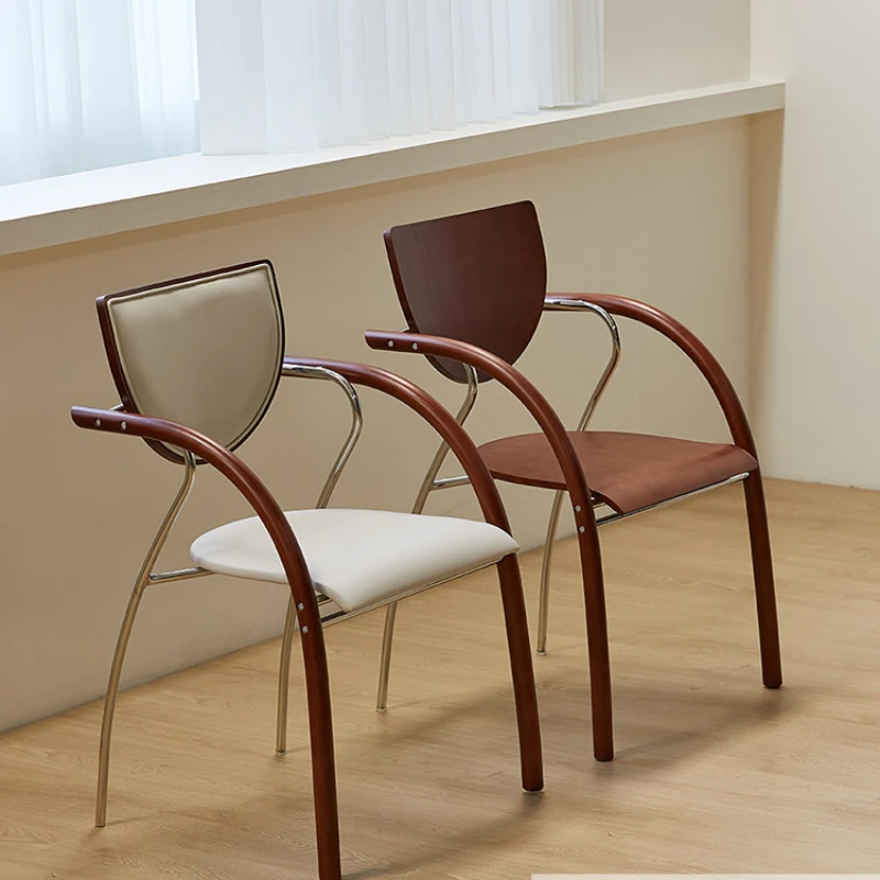 Stackable simple retro soft bag dining chair Modern designer backrest solid wood armrest chair stainless steel dining table and
Stackable simple retro soft bag dining chair Modern designer backrest solid wood armrest chair stainless steel dining table and