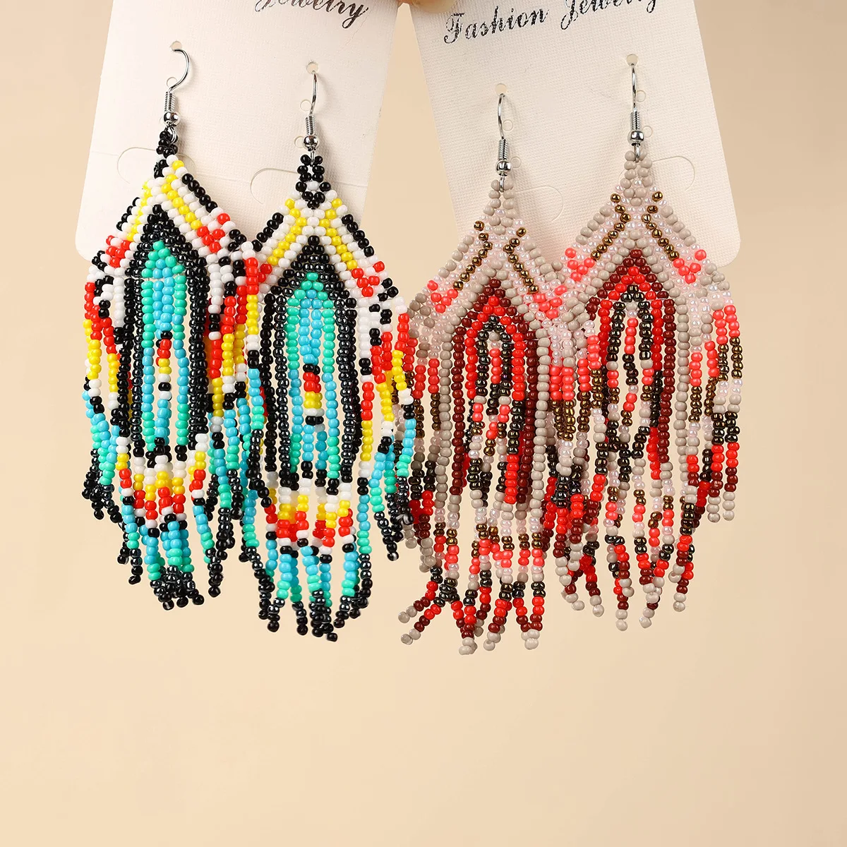 

Rice bead earrings Tassel Geometry Design Originality Hand knitting Bohemia Alloy Fashion Simple Beaded earrings