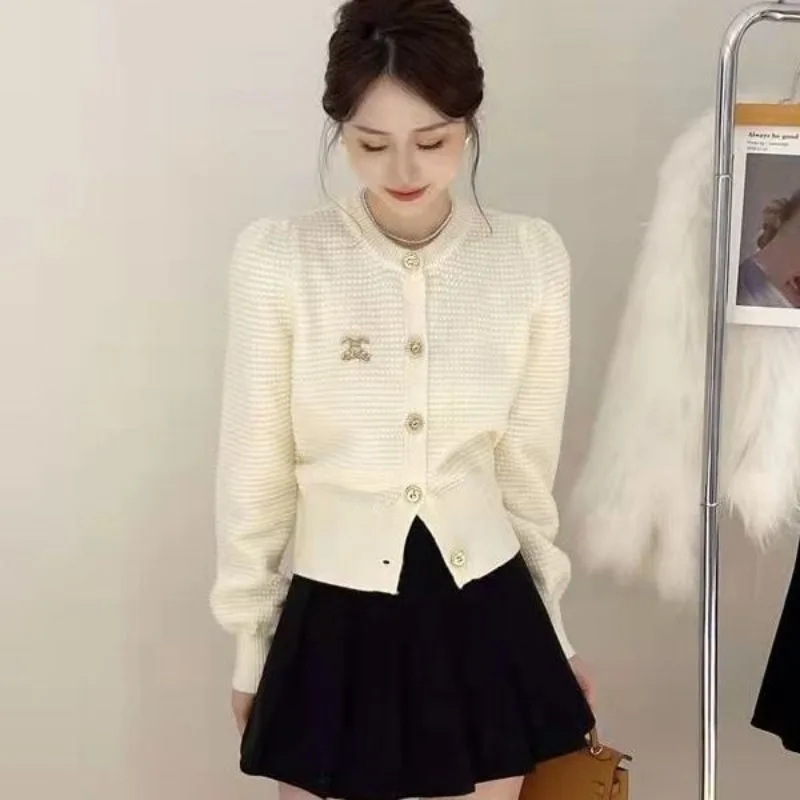 Y2k New Chic Knitted Cardigans Spring Autumn Women Cashmere Sweater Coat Solid Korean Short Jackets Knitwear Gold Button
Y2k New Chic Knitted Cardigans Spring Autumn Women Cashmere Sweater Coat Solid Korean Short Jackets Knitwear Gold Button