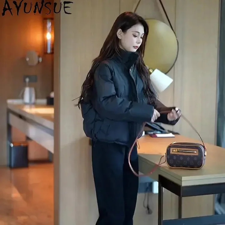 Пуховик женский х/б, свободного кроя, с воротником-стойкой 
Пуховик женский х/б, свободного кроя, с воротником-стойкой