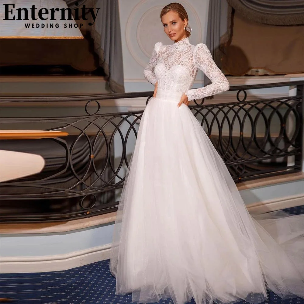 Classical High Neck Lace Wedding Dresses A Line Long Sleeves Bridal Gowns Illusion Back With Buttons Pleats Vestidos De Novia
Classical High Neck Lace Wedding Dresses A Line Long Sleeves Bridal Gowns Illusion Back With Buttons Pleats Vestidos De Novia