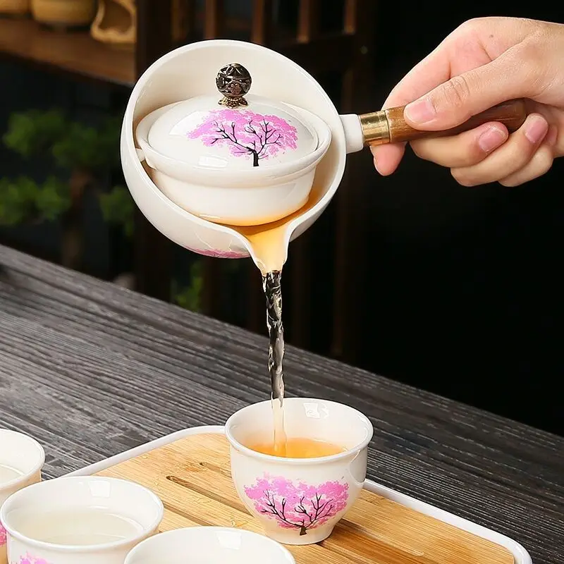 Portable Traveling Tea Set, Complete Set of Ceramic Kung Fu Automatic Rotation, 1 Pot, 4 Cups, Side Handle, Maker
Portable Traveling Tea Set, Complete Set of Ceramic Kung Fu Automatic Rotation, 1 Pot, 4 Cups, Side Handle, Maker