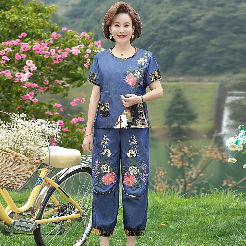 2022 Middle Women Summer Dress Loose Suit Women Short-sleeved Wide-leg Pants 2 Sets 5XL Embroidered Shirt + Pants Suit 
2022 Middle Women Summer Dress Loose Suit Women Short-sleeved Wide-leg Pants 2 Sets 5XL Embroidered Shirt + Pants Suit