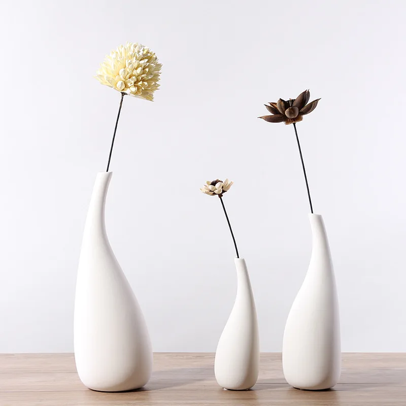 Nordic minimalist style ins water drop ceramic vase ornament white plain burnt dried flower flower arrangement creative ornament
Nordic minimalist style ins water drop ceramic vase ornament white plain burnt dried flower flower arrangement creative ornament