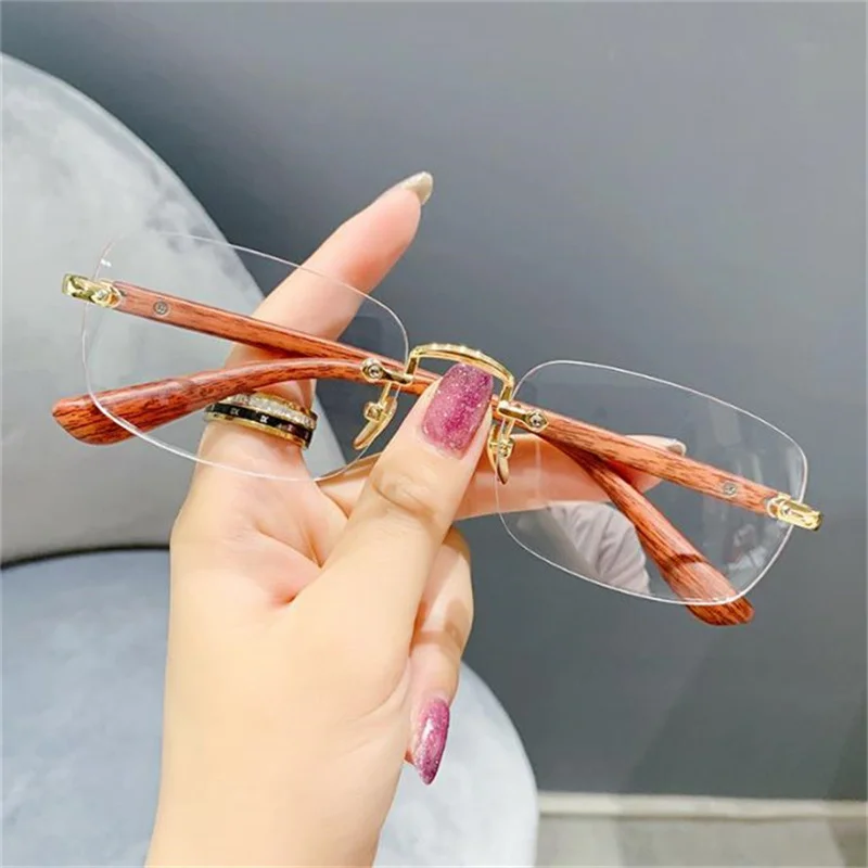 NEW Anti-Blue Light Glasses Unisex Rimless Optical Eyewear Rectangle Spectacles Bamboo Proof Wood Temples Eyeglasses Ornamental
NEW Anti-Blue Light Glasses Unisex Rimless Optical Eyewear Rectangle Spectacles Bamboo Proof Wood Temples Eyeglasses Ornamental