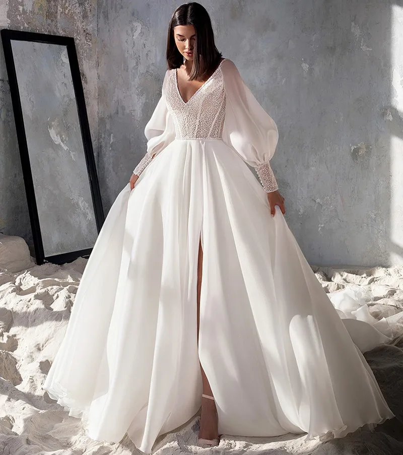 Elegant A-line Organza Weddig Dresses 2024 V-neck Pearls Long Puffy Sleeves Silt Bridal Gown Robe Fête De Mariage
Elegant A-line Organza Weddig Dresses 2024 V-neck Pearls Long Puffy Sleeves Silt Bridal Gown Robe Fête De Mariage
