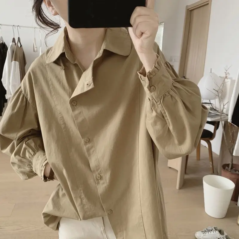 Spring and Autumn Women's Polo Collar Button Splice Solid Irregular Shirt Loose Lantern Fashion Casual Elegant Long Sleeve Tops
Spring and Autumn Women's Polo Collar Button Splice Solid Irregular Shirt Loose Lantern Fashion Casual Elegant Long Sleeve Tops