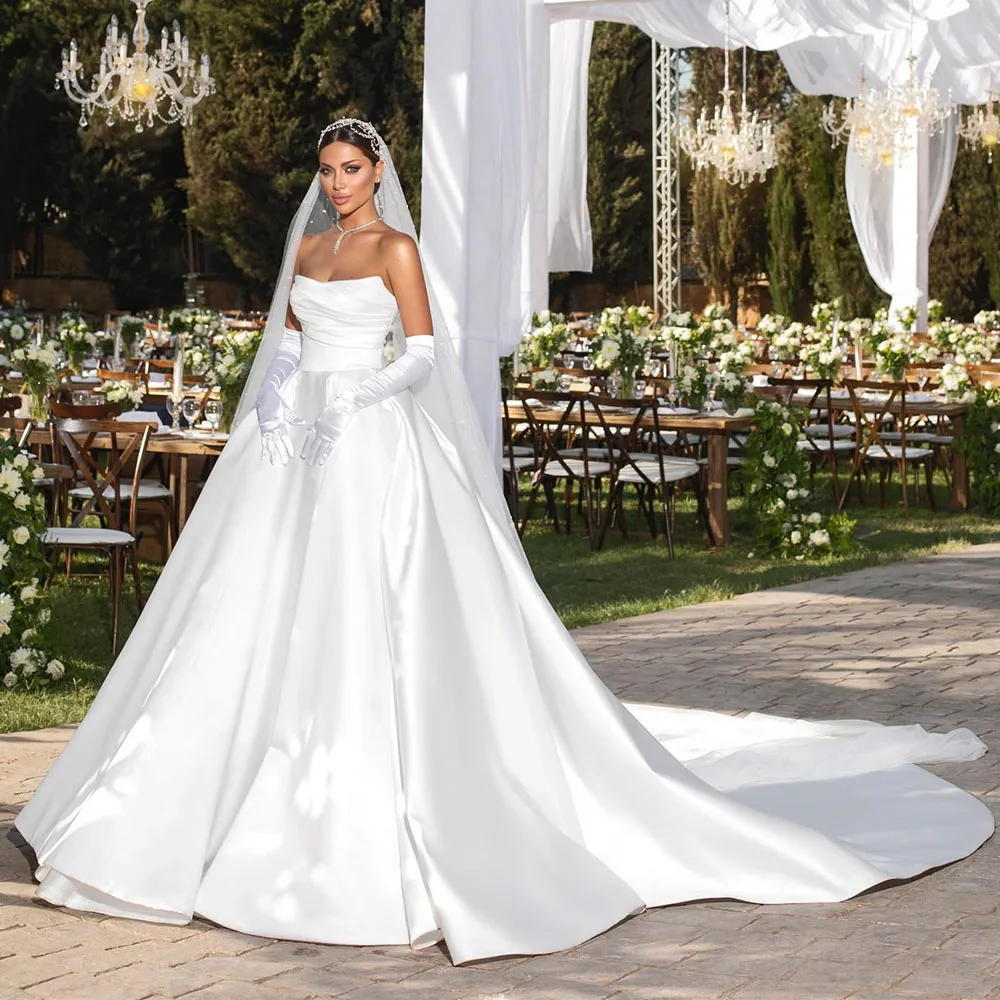 Elegant Wedding Dress White Satin Ball Gown V Neck Sleeveless Luxury for Women 2023 Bride Court Train Bridal s
Elegant Wedding Dress White Satin Ball Gown V Neck Sleeveless Luxury for Women 2023 Bride Court Train Bridal s