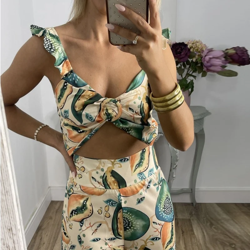 Women Summer Beach Two Piece Suit High Waist Flare Pant Outfits Ladies Printing Fashion Casual Ruffle Straps Tops Long Pants Set
Women Summer Beach Two Piece Suit High Waist Flare Pant Outfits Ladies Printing Fashion Casual Ruffle Straps Tops Long Pants Set