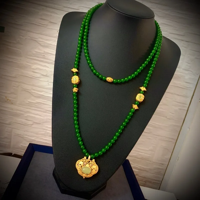 Набор зеленых бусин, съемная цепочка на свитер, ожерелье, много петель, ручная нить, песок, золотой кулон Ruyi.
Набор зеленых бусин, съемная цепочка на свитер, ожерелье, много петель, ручная нить, песок, золотой кулон Ruyi.