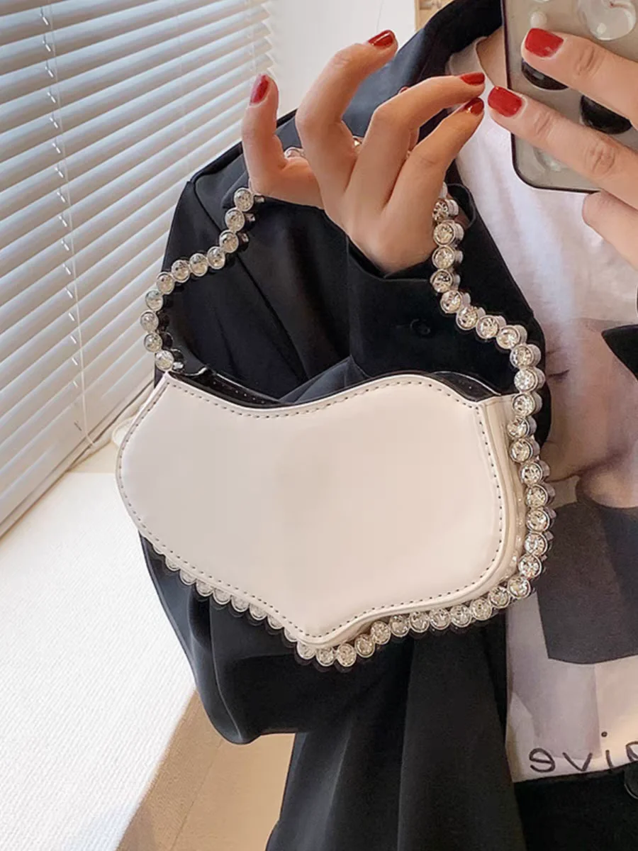 Niche Designer Luxury Mini Handbag High-end Fashion Western-style Diamond-encrusted Bag Commuting Versatile Handbag Evening Bag
Niche Designer Luxury Mini Handbag High-end Fashion Western-style Diamond-encrusted Bag Commuting Versatile Handbag Evening Bag