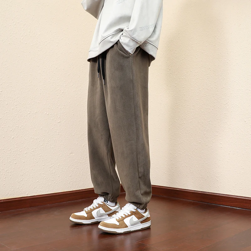 Autumn Winter New Solid Color Fashion Elastic Waist Sweatpants Man High Street Casual Pocket Drawstring Thicken Warm Trousers
Autumn Winter New Solid Color Fashion Elastic Waist Sweatpants Man High Street Casual Pocket Drawstring Thicken Warm Trousers